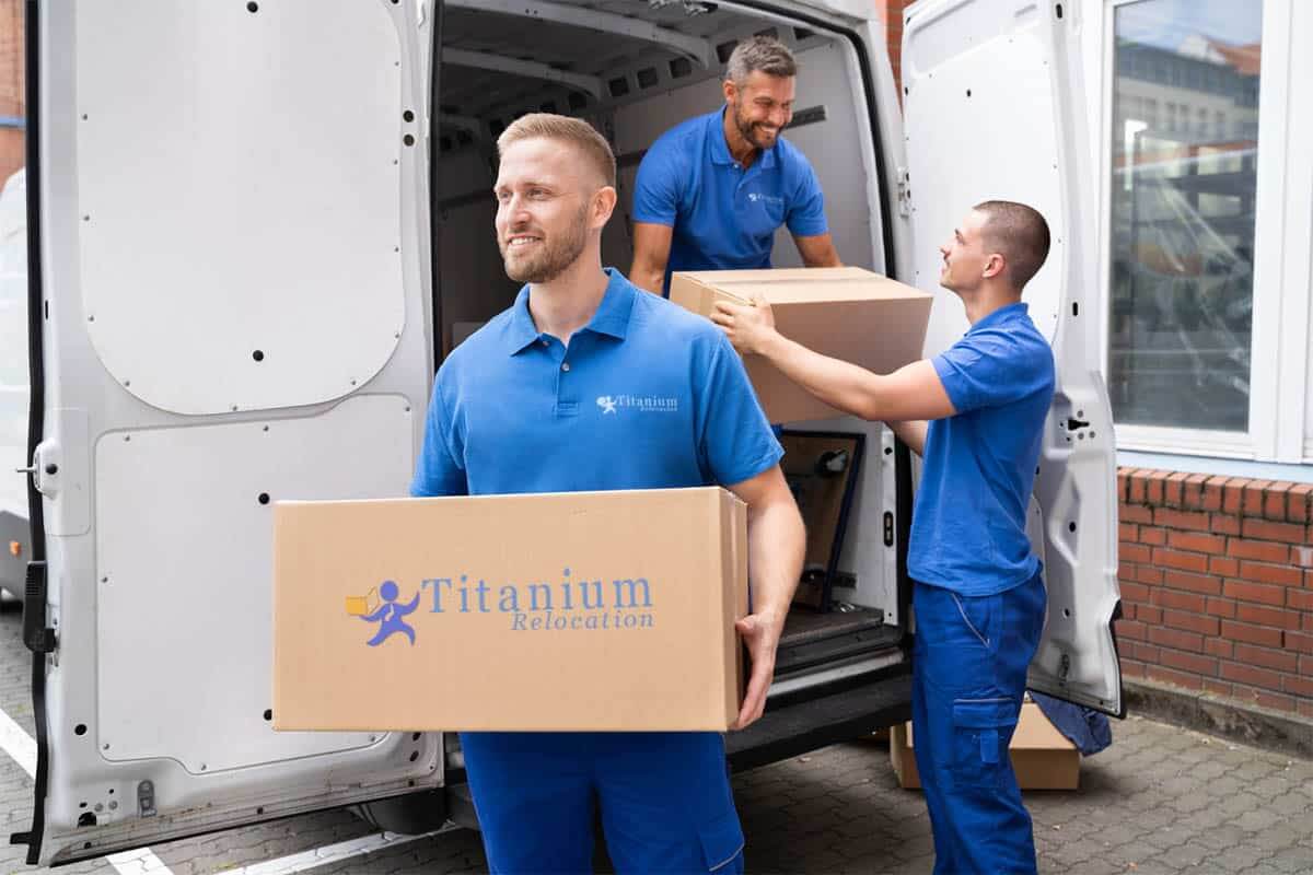 Titanium Relocation moving crew loading boxes